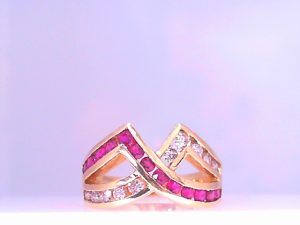 Lady's Yellow 14 Karat Contemporary Fashion Ring Size 6 Round Rubys
Round Diamonds