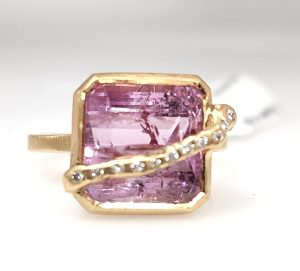 Lady's Yellow 14 Karat Satin Vault Line Fashion Ring Size 7.5 one = 8.30ct Princess Pink Precious Topaz
11 = 0.04tw Round Diamonds