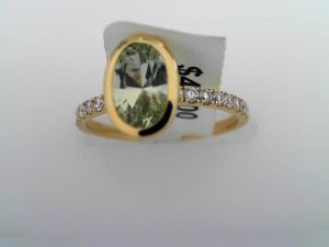 Lady's Yellow 18 Karat Diamond Cut Bezel Set  Woth  Pave Accents Fashion Ring Size 7 one = 1.17ct Oval Very Slightly Bluish Green Very Slightly Grayish Sapphire
16 = 0.24tw Round F/G SI1 Diamonds