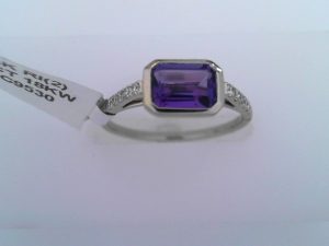 Lady's White 18 Karat Bezel Set East West Catherdral Fashion Ring Size 6.5 one = 0.91ct Emerald Purple Strong Amethyst
12 = 0.13tw Round F/G SI1 Diamonds