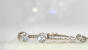 Lady's Sterling Silver Hammered French Wire Earrings 2=4.00mm Round Blue Topazs
Kir Shaker Group