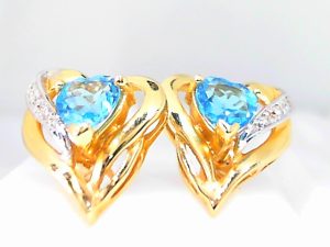 Lady's Yellow 14 Karat Stud Earrings 2= Heart Blue Topazs
6= Round Diamonds
