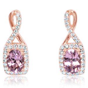Lady's Rose 14 Karat Drop Earrings 2 = 1.42tw Oval Pink Lotus Garnets
= 0.29tw Round G/H SI2 Diamonds
Two 6.5 x 4.5 mm Oval Lotus Garnets from Tanzania (1.42 tcw) - 46RLG - Enhancement: None (Natural)
Total Gem Weight: 1.42 tcw
Diamonds:
Stone Count:56
Total weight: 0.29 ct
Grade: H-I SI2