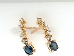 Lady's Yellow 10 Karat Drop Earrings 2 = Oval Sapphires
10 = Round Diamonds