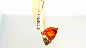 Lady's Pendants 5=0.43tw Round Diamonds
one Trillian Orange Strong Garnet