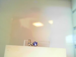 Lady's White 10 Karat Drop Necklace Length 20 With One 0.20Ct Pear Tanzanite And One Round Diamond