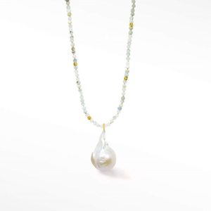 Nina Wynn Aquamarine 18 KG White Baroque Pearl Free Form Necklace, 15/19"
Chain: Bead, Fabricated Dog Bone
Metal: 18 Karat
Color: Yellow