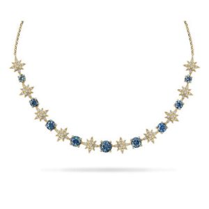 Lady's Yellow 14 Karat Mont Sapp & Dia Necklace With = 0.61Tw Round E/F Vs2 Diamonds And 9 = 2.75Tw Round Blue Montana Sapphires Chain: Cable Link
Metal: 14 Karat
Color: Yellow
Length: 1618
Gemstones:
5 mm Round Montana Sapphire from Montana, USA (0.59 ct) - 50MS - Enhancement: Heated
Two 4.5 mm Round Montana Sapphires from Montana, USA (0.84 tcw) - 4RMS - Enhancement: Heated
Two 4 mm Round Montana Sapphires from Montana, USA (0.60 tcw) - 40MS - Enhancement: Heated
Two 3.5 mm Round Montana Sapphires from Montana, USA (0.44 tcw) - 36MS - Enhancement: Heated
Two 3 mm Round Montana Sapphires from Montana, USA (0.28 tcw) - 30MS - Enhancement: Heated
Total Gem Weight: 2.75 tcw
Diamonds:
Stone Count: 90
Total weight: 0.61 ct
Grade: FG VS2-SI1
