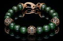 Gorgeous green jade surrounds 3 frosted onyx beads encased in solid 18K rose gold. A nod to the remarkable artisan history of gold and jade integrated into timeless statements of elegance. Finished with 18K rose gold end caps and clasp, Strength demands attention and elevates any ensemble.