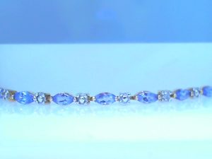 Lady's Yellow 10 Karat Tennis Bracelet Length 7 With Marquise Tanzanites