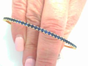 GEMMA COUTURE Lady's Yellow 14 Karat Blue Sapphire Flexible Bracelet Bracelet = 1.68tw Round Blue Sapphires