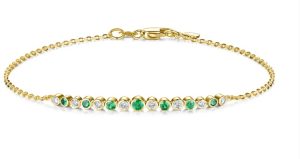 Lady's White 14 Karat Adjustable Bracelet Length 7 8 = 0.23tw Round G/H SI1 Diamonds
7 = 0.22tw Round Green Emeralds