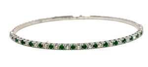 Lady's White 14 Karat Flex Bangle Bracelet 17 = 0.87tw Round G/H VS2 Diamonds
17 = 0.82tw Round Green Emeralds