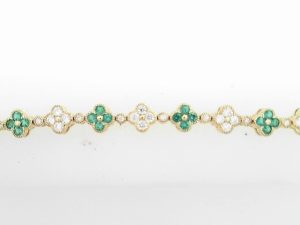 Lady's Yellow 14 Karat Clover Emerald Diamond Alternating Bracelet Bracelet Length 7.5 71 = 1.44tw Round G SI1 Diamonds
48 = 1.40tw Round Green Strong Emeralds STONES: Emerald and Diamond