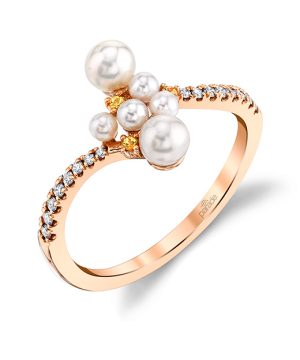 Lady's White 18 Karat Cluster Ring Size 6.5 With 19=0.12Tw Round Diamonds And 6= Potato Pearls
Gram Wt: 2.03 gr