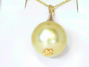Lady's Yellow 14 Karat Strand Length 18 With One 15.00Mm South Sea Pearl And 6=0.02Tw Round Diamonds
