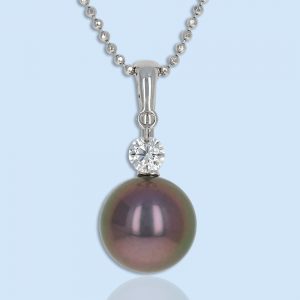 Lady's Yellow 18 Karat Strand Length 18 With One 8.00Mm Tahitian Pearl And One 0.10Ct Round Diamond - floating diamond