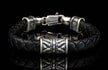 The ‘Thunderbloom’ leather bracelet features rich, braided lambskin leather adorned with textured and patinated sterling silver details, offering a depth of appearance that is uniquely William Henry. This handcrafted piece radiates character with a look and feel that can only be achieved through uncompromising artistry.