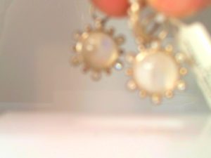 NINA WYNN ATHENA  White Sterling Silver 10Mm Aquamarine/Nat Diamond Earring Charm 
Diamond Information
Shape: Round
Diamond Size: 1.2mm
Number:12
Clarity: SI1
Total Carat Weight: 0.15
Gemstone Information
Stone Size: 10mm
Number:2
Total Carat Weight: 10