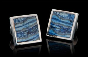 FOSSIL MAMMOTH TOOTH
The woolly mammoth is the next most depicted animal in Ice Age art after horses and bisons, and these images were produced up to 11,500 years ago. Today, more than five hundred depictions of woolly mammoths are known, in media ranging from carvings and cave paintings located in 46 caves in Russia, France and Spain, to sculptures and engravings made from different materials.

William Henry's fossil Mammoth tooth is harvested in Alaska and Siberia. It is a rare and mesmerizing material, a living testimony of the dawn of Mankind.