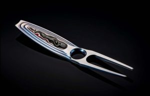 William Henry Oakland Hills Titanium Divot Tool - Inlaid with Fordite, a/k/a "Motor City Agate"
Up your game! Or at least your style while out on the links with this gorgeous divot tool from William Henry. The 'Oakland Hills' features a solid body machined from aerospace grade titanium, anodized to a beautiful blue, and inlaid with Fordite, A.K.A. 'Motor City Agate'. The oversized chamfered hole gives your thumb a great resting point for control during use (and it looks cool, too).